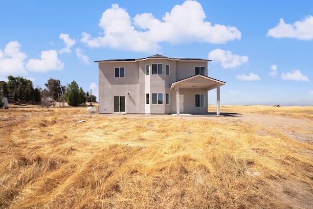 36950 Pauline Ave, Madera, CA 93636 - rear view of property featuring stucco siding and a patio