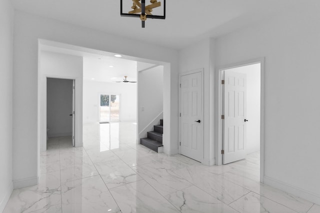 36950 Pauline Ave, Madera, CA 93636 - unfurnished room with stairs, ceiling fan, light marble finish floors, and recessed lighting
