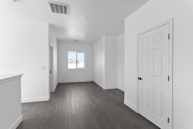 36950 Pauline Ave, Madera, CA 93636 - empty room featuring dark wood-style floors and baseboards