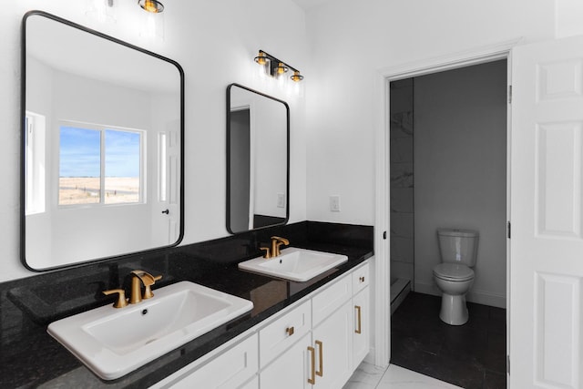 36950 Pauline Ave, Madera, CA 93636 - full bathroom featuring double vanity and marble look tiles