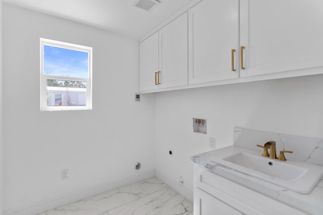 36950 Pauline Ave, Madera, CA 93636 - washroom featuring electric dryer hookup, cabinet space, hookup for a washing machine, and light marble finish flooring