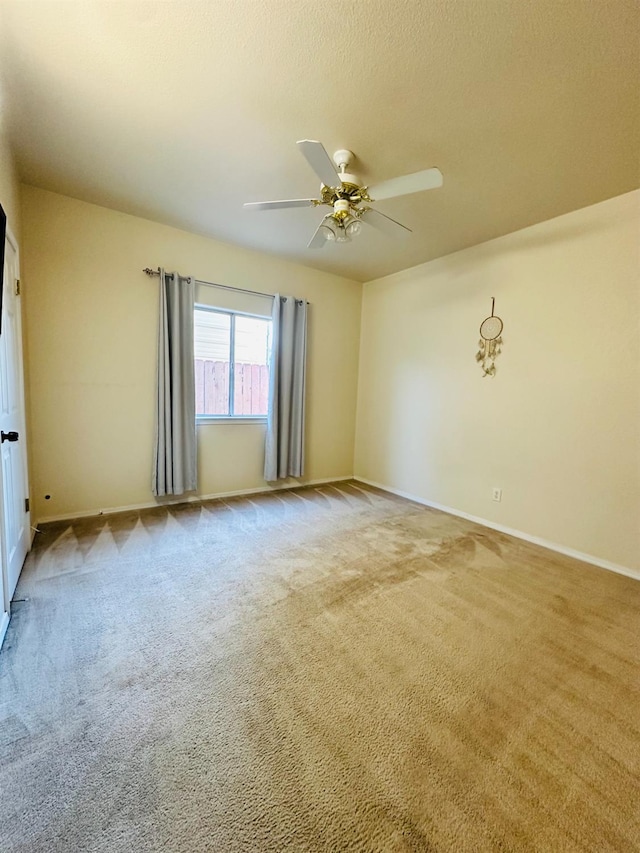 924 Palm Ave, Fowler, CA 93625 - spare room with carpet and a ceiling fan