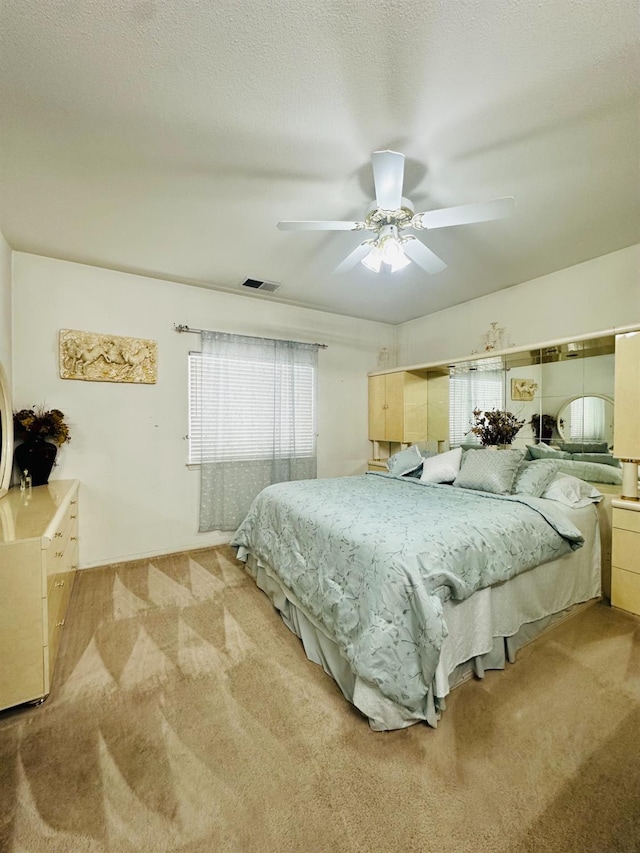 924 Palm Ave, Fowler, CA 93625 - bedroom with light carpet and ceiling fan