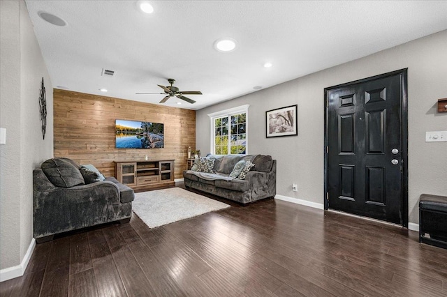 1440 E Fountain Way, Fresno, CA 93704 - living room with a ceiling fan, wood finished floors, recessed lighting, and wood walls