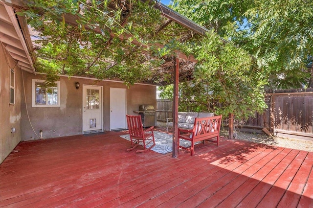1440 E Fountain Way, Fresno, CA 93704 - deck with a grill, a fenced backyard, and outdoor lounge area