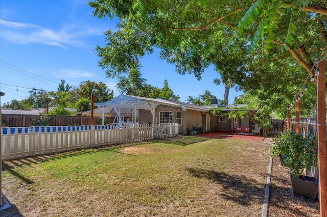 1440 E Fountain Way, Fresno, CA 93704 - fenced backyard featuring a patio area and a pool