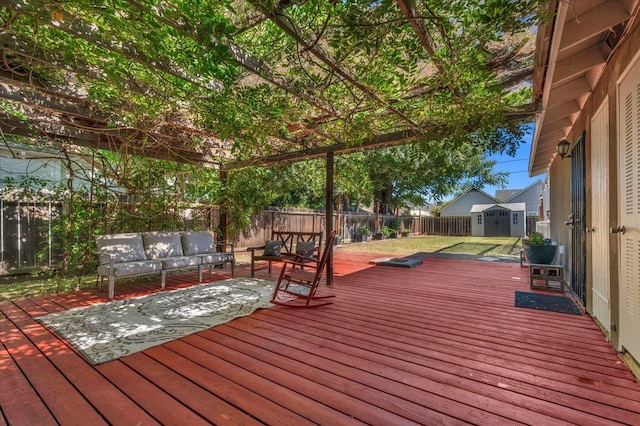1440 E Fountain Way, Fresno, CA 93704 - wooden deck featuring a fenced backyard, a shed, and an outdoor living space