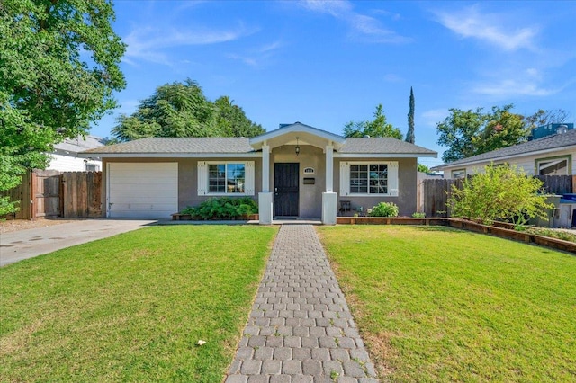 1440 E Fountain Way, Fresno, CA 93704 - ranch-style house featuring stucco siding, concrete driveway, and an attached garage