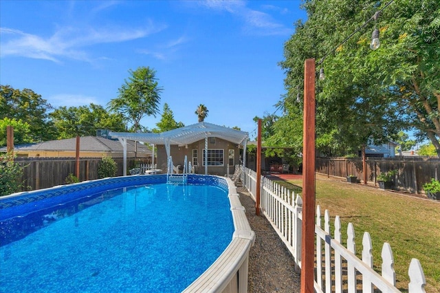 1440 E Fountain Way, Fresno, CA 93704 - view of pool featuring a fenced backyard and a pergola