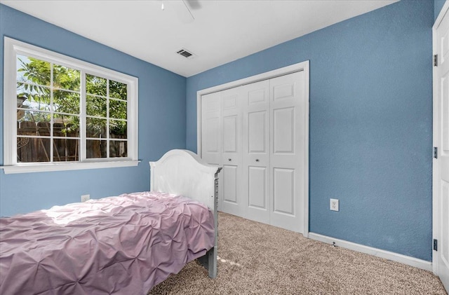 1440 E Fountain Way, Fresno, CA 93704 - carpeted bedroom with a closet and ceiling fan