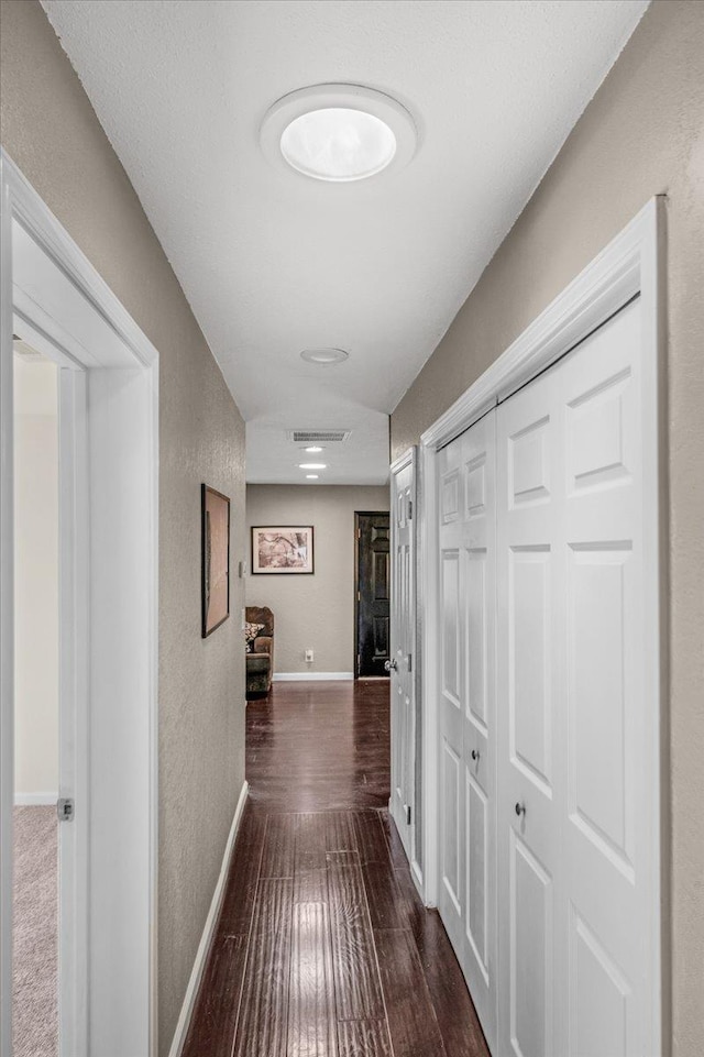 1440 E Fountain Way, Fresno, CA 93704 - hall featuring a textured wall and wood finished floors