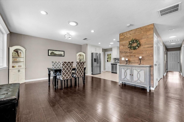 1440 E Fountain Way, Fresno, CA 93704 - dining space with wood finished floors and recessed lighting