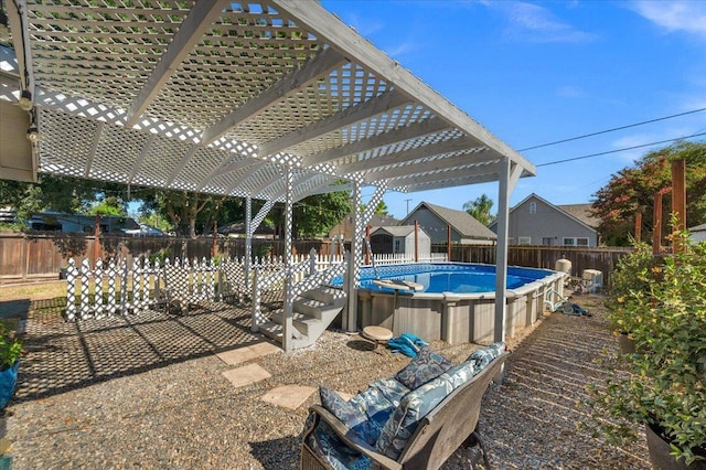 1440 E Fountain Way, Fresno, CA 93704 - view of pool with a pergola and a fenced backyard