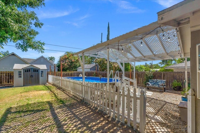1440 E Fountain Way, Fresno, CA 93704 - view of pool featuring a pergola, a storage shed, and a fenced backyard