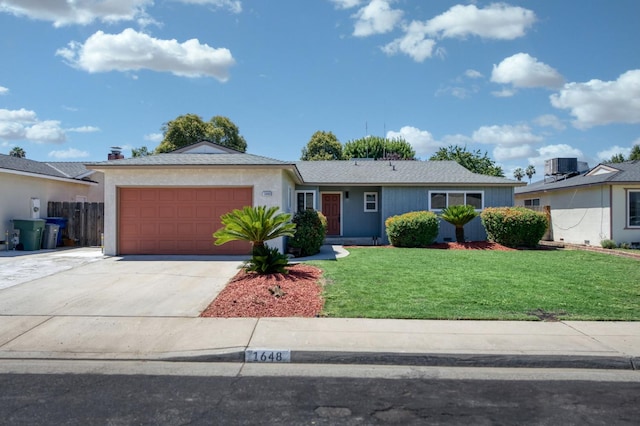 1648 Purvis Ave, Clovis, CA 93611 - single story home featuring a garage and concrete driveway