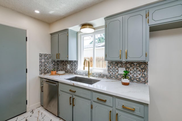 1648 Purvis Ave, Clovis, CA 93611 - kitchen featuring dishwasher, gray cabinets, light marble finish floors, decorative backsplash, and a textured ceiling