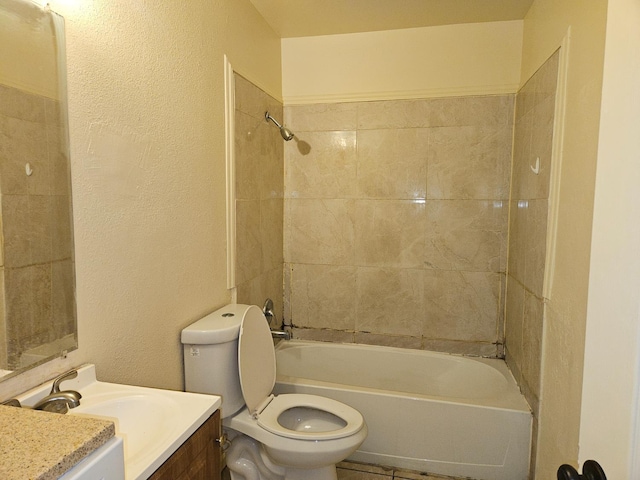 1490 N First, Fresno, CA 93703 - bathroom featuring vanity, bathtub / shower combination, and a textured wall