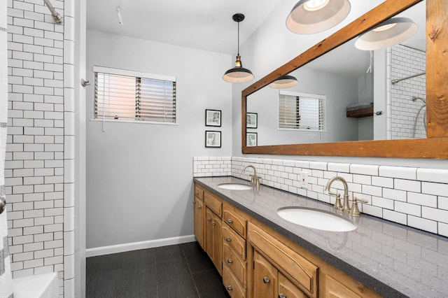 2344 E Menlo Ave, Fresno, CA 93710 - bathroom with tasteful backsplash, double vanity, tile patterned floors, shower / washtub combination, and plenty of natural light