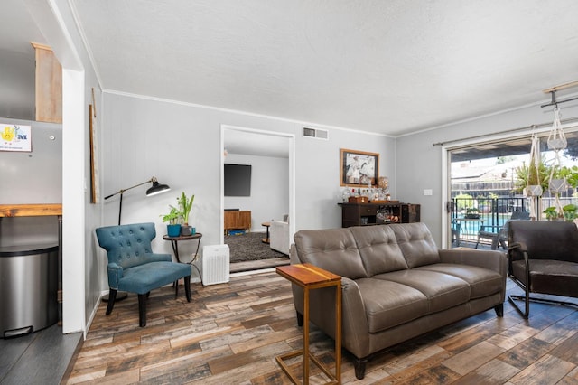 2344 E Menlo Ave, Fresno, CA 93710 - living area featuring wood finished floors and ornamental molding