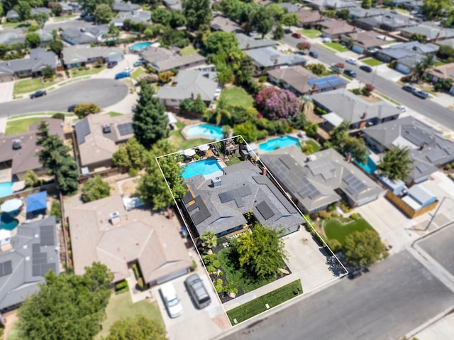 2344 E Menlo Ave, Fresno, CA 93710 - aerial view of residential area featuring a pool area and property boundaries highlighted
