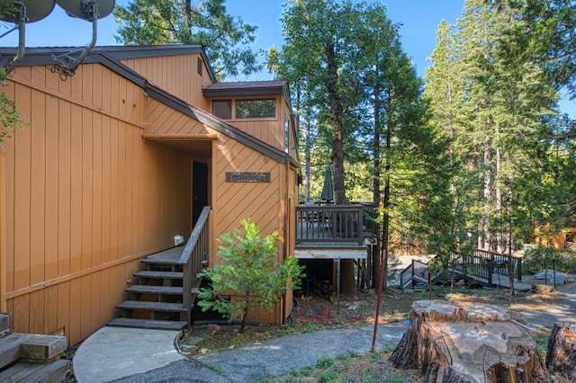 40904 Mill Run Ln Unit 60, Shaver Lake, CA 93664 - view of home's exterior featuring a deck and stairs
