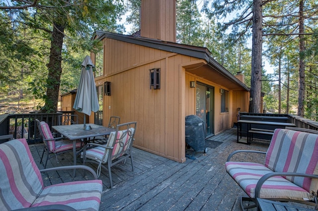 40904 Mill Run Ln Unit 60, Shaver Lake, CA 93664 - wooden deck featuring outdoor dining space