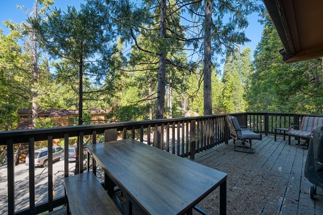 40904 Mill Run Ln Unit 60, Shaver Lake, CA 93664 - wooden terrace with outdoor dining area