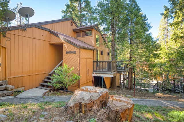 40904 Mill Run Ln Unit 60, Shaver Lake, CA 93664 - rear view of house with a deck and stairs