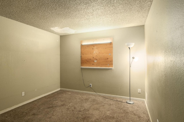 5051 E Lewis Ave, Fresno, CA 93727 - empty room with carpet flooring and a textured ceiling