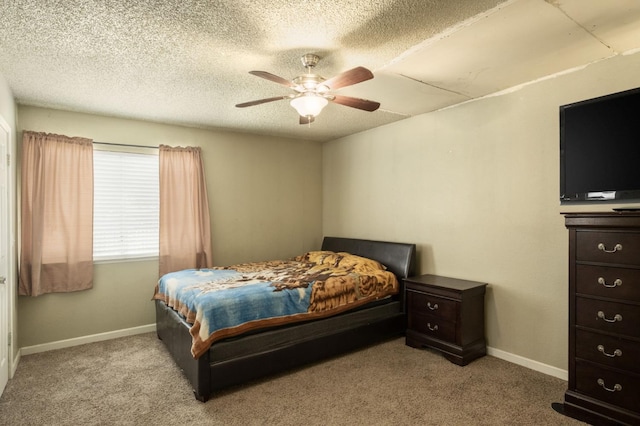 5051 E Lewis Ave, Fresno, CA 93727 - bedroom featuring carpet floors, ceiling fan, and a textured ceiling