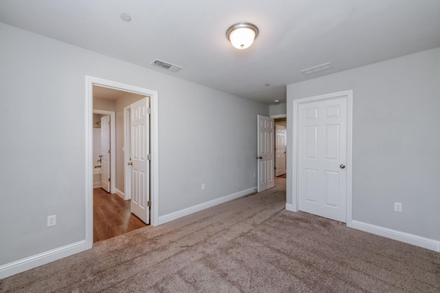 7393 E Michigan Ave, Fresno, CA 93737 - unfurnished bedroom featuring carpet floors and baseboards