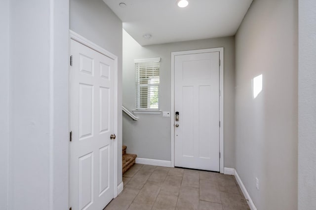 7393 E Michigan Ave, Fresno, CA 93737 - foyer featuring stairs and light tile patterned floors