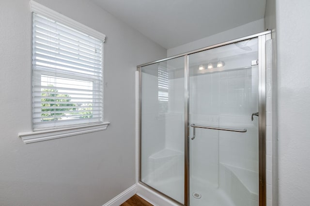 7393 E Michigan Ave, Fresno, CA 93737 - bathroom with a shower stall and baseboards