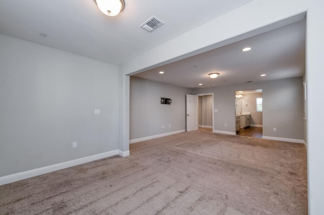 7393 E Michigan Ave, Fresno, CA 93737 - unfurnished living room featuring carpet floors and recessed lighting