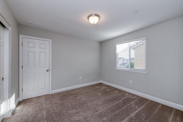 7393 E Michigan Ave, Fresno, CA 93737 - empty room with carpet flooring and baseboards