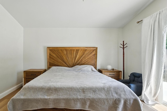 6431 E Inyo St, Fresno, CA 93727 - bedroom featuring wood finished floors and baseboards