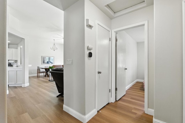 6431 E Inyo St, Fresno, CA 93727 - hallway with light wood-style flooring