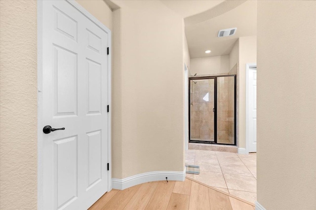2481 S Via Versilia Dr, Fresno, CA 93727 - hall featuring baseboards and light wood-style floors