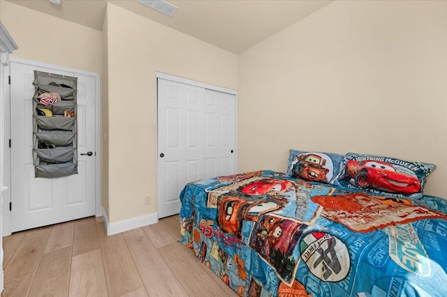 2481 S Via Versilia Dr, Fresno, CA 93727 - bedroom with light wood finished floors and baseboards