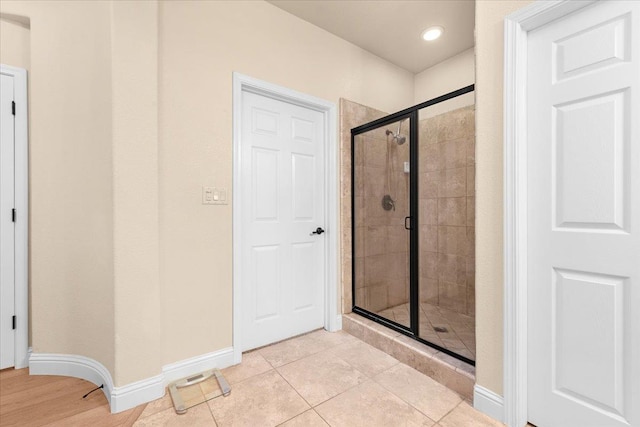 2481 S Via Versilia Dr, Fresno, CA 93727 - full bath with a stall shower, tile patterned flooring, and recessed lighting