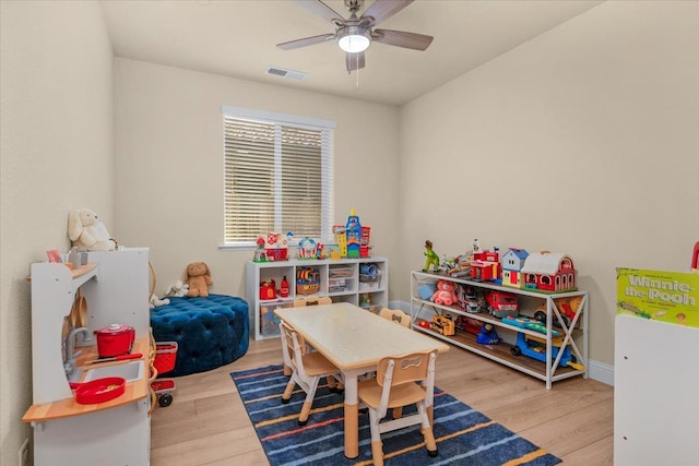 2481 S Via Versilia Dr, Fresno, CA 93727 - rec room featuring wood finished floors and ceiling fan