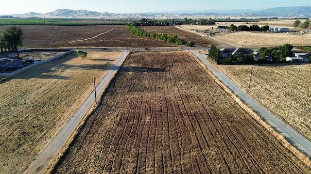 10465 E Herndon Ave, Clovis, CA 93619 - view of rural area featuring farmland and a mountainous background