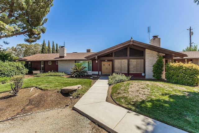 10465 E Herndon Ave, Clovis, CA 93619 - view of front of home with a chimney and a front lawn
