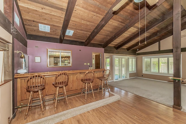 10465 E Herndon Ave, Clovis, CA 93619 - indoor dry bar with a wood ceiling with exposed beams, wood finished floors, and high vaulted ceiling