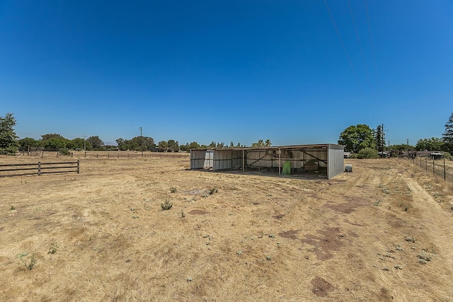 10465 E Herndon Ave, Clovis, CA 93619 - view of yard featuring a view of rural / pastoral area, an outbuilding, and a pole building