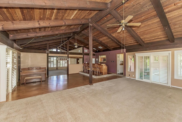 10465 E Herndon Ave, Clovis, CA 93619 - unfurnished living room featuring wooden ceiling, carpet flooring, healthy amount of natural light, ceiling fan, and wood finished floors