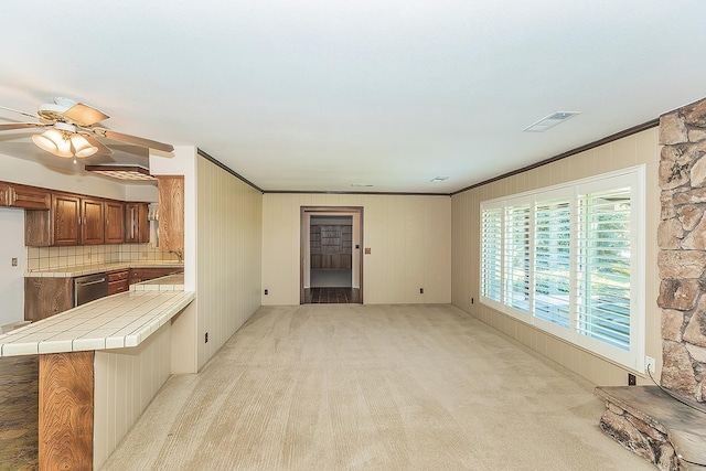 10465 E Herndon Ave, Clovis, CA 93619 - unfurnished living room with ornamental molding, light carpet, and a ceiling fan