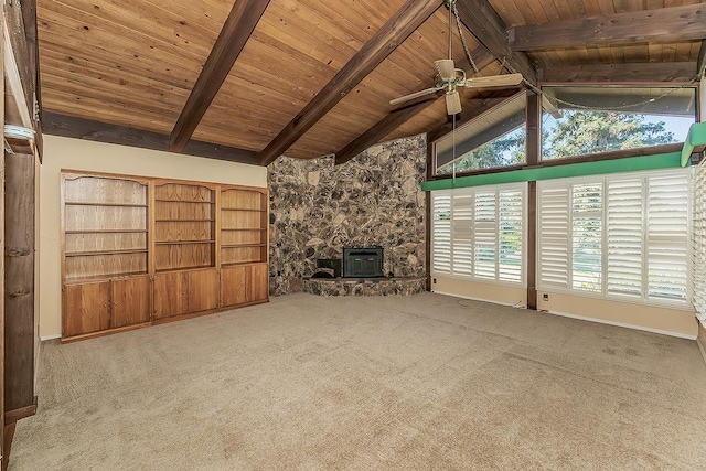 10465 E Herndon Ave, Clovis, CA 93619 - unfurnished living room featuring ceiling fan, a wood ceiling with exposed beams, carpet, a wood stove, and high vaulted ceiling