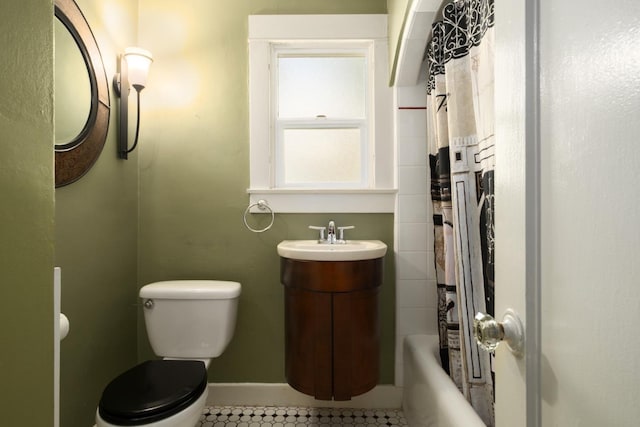 321 E Brown, Fresno, CA 93704 - full bathroom featuring tile patterned flooring, vanity, and shower / bath combo with shower curtain