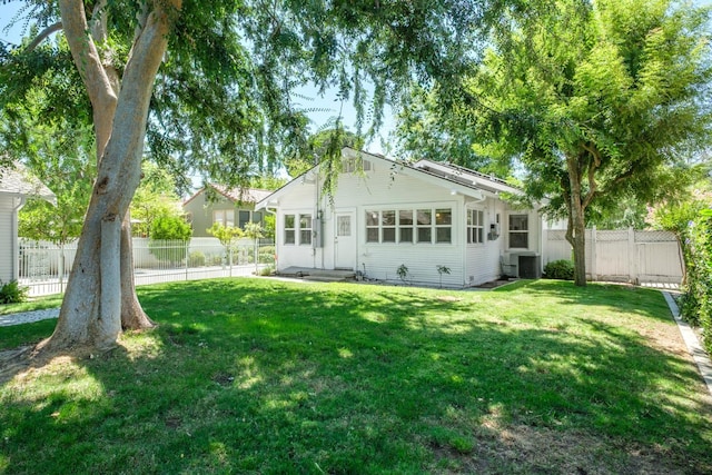 321 E Brown, Fresno, CA 93704 - back of house with entry steps and a fenced backyard